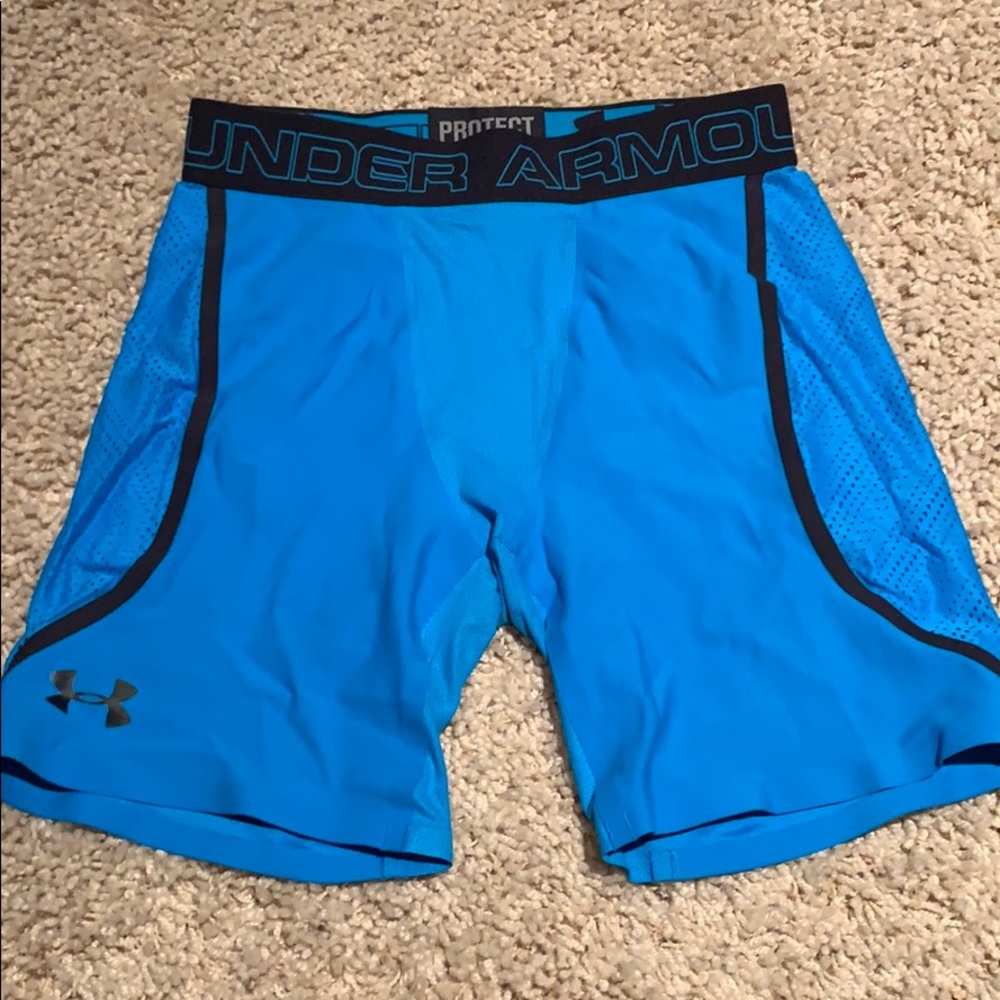 Light blue under armour compression shorts.